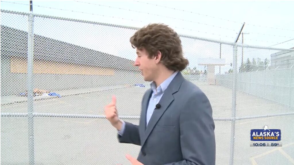 Alaska News Source in front of the closed Carrs grocery store in Fairview